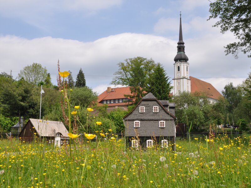 Umgebindehauspark und Dorfkirche Cunewalde Abbildung Umgebindehauspark und Dorfkirche Cunewalde